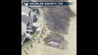 Firefighters stop grass fire before it reaches homes in Douglas County, Colorado