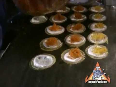 Street Vendor Prepares Khanom Buang - ImportFood