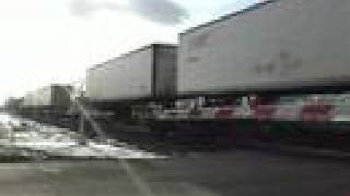 preview picture of video 'CSX trailer train, Lancaster NY, 3-28-08'