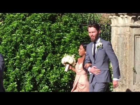 A flower arch and lavish floral display for a wedding at Four Seasons Hotel Hampshire