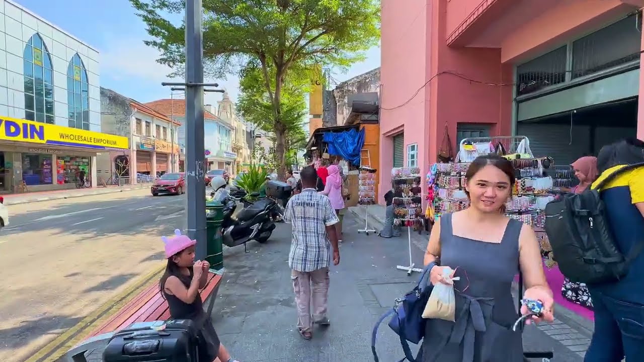 Immersive street-level walking tour through Penang Batu Ferringhi, Malaysia, showcasing authentic urban landscapes, local architecture, and the vibrant atmosphere of the city's neighborhoods