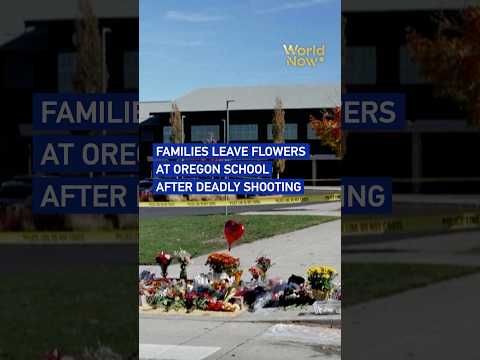 Families leave flowers at Oregon school after deadly shooting