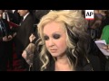 Stars arrive at Grammy Awards, react to the death of Whitney Houston