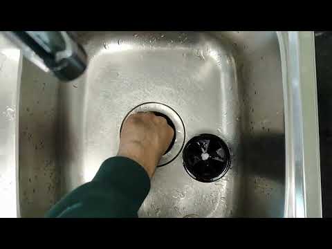 Reset and troubleshoot waste disposal in a sink