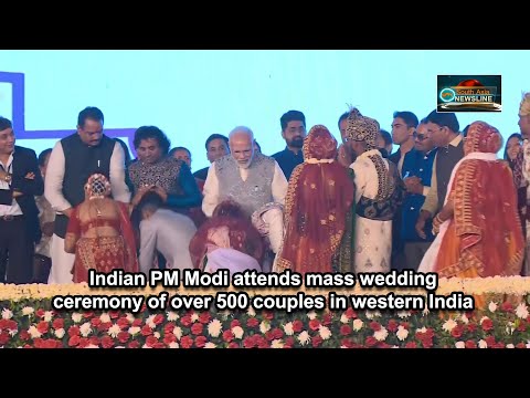 Indian PM Modi attends mass wedding ceremony of over 500 couples in western India