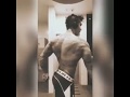 Young Bodybuilder Practicing Flexed Muscle Poses - Alejandro Arango