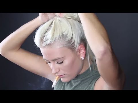 Bottle blonde smokes a cigarette