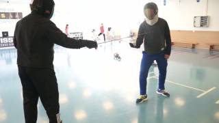 Sabre parry quarte with step back