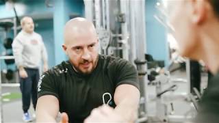 PureGym Bournemouth The Triangle: Squat racks, turf area, resistance machines, and free weights in a modern gym setting.
