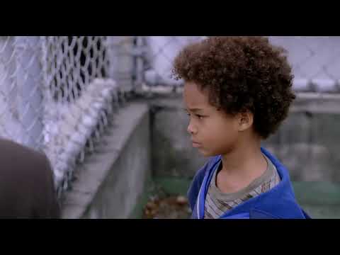 The Pursuit of Happyness trailer still: Chris and Christopher walking hand-in-hand through San Francisco