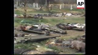 RUSSIA:CHECHNYA: BODIES UNEARTHED IN A MASS SHALLOW GRAVE
