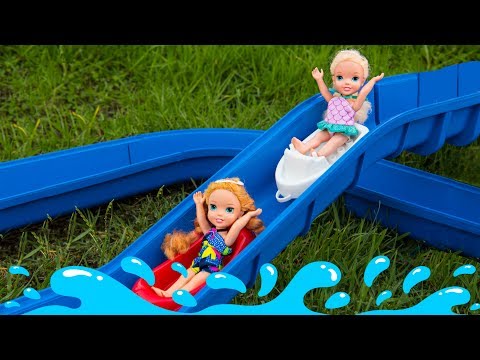 Elsa and Anna toddlers fun at the water park