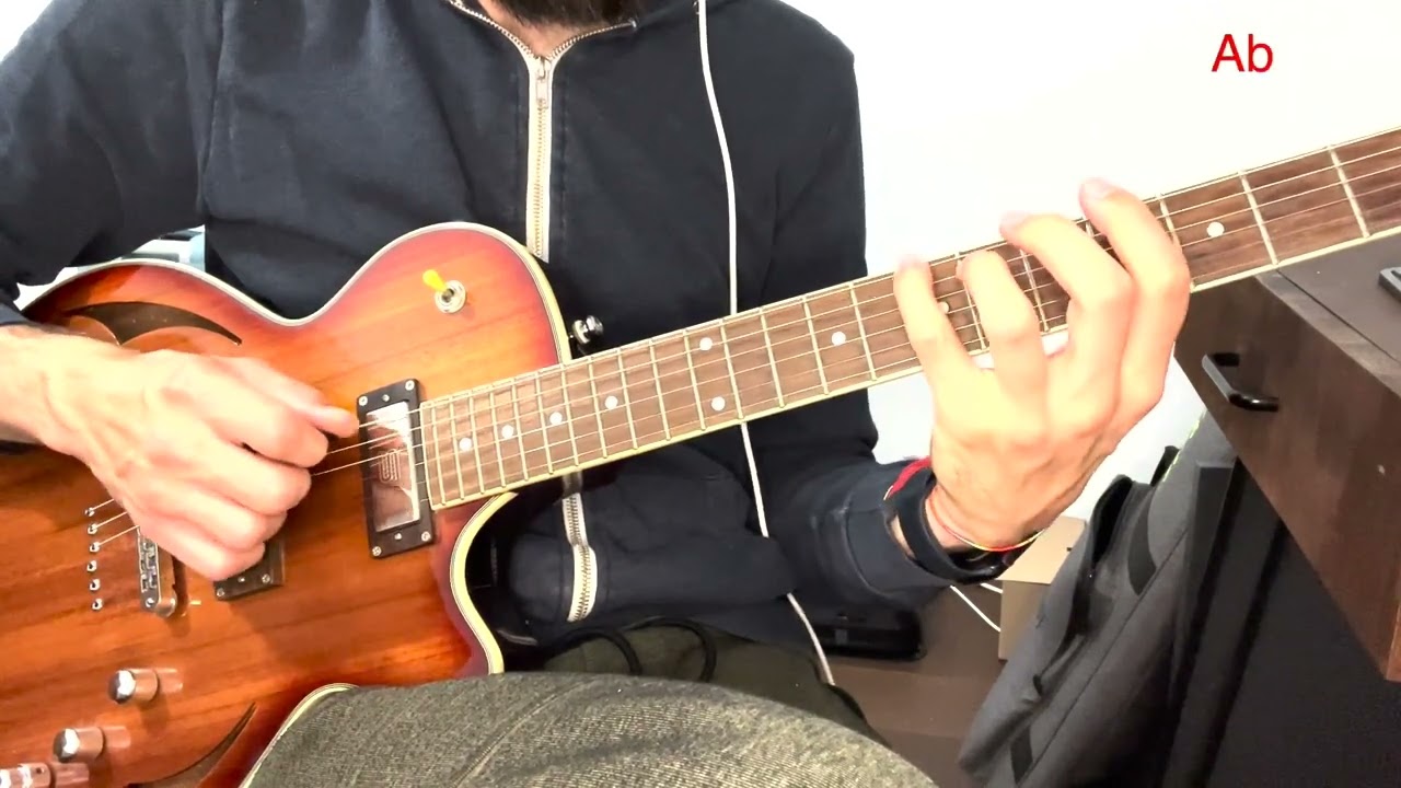 Guitarist demonstrating minor 7 voice-leading arpeggios moving through the circle of fourths