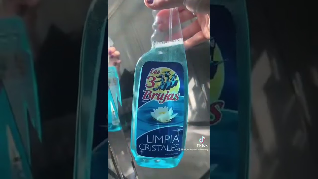 Cleaning a Mirror with Las 3 Brujas - Spanish Cleaning Products
