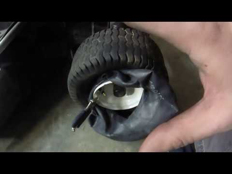 Installing riding mower inner tube using basic tools without taking the tire off