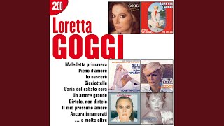 Kadr z teledysku Per amarti così tekst piosenki Loretta Goggi