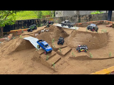 Rc car racing on the top of the mountain, crossing the bridge,Rc Hilux Jeep Crawler Toyota Defender.