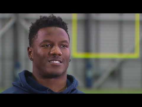 Chris Carson on his toughness on, and off, the field