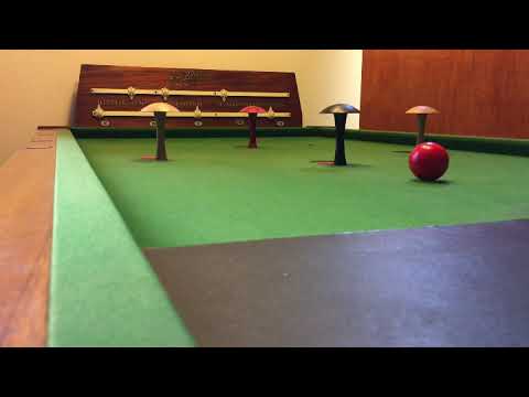 Bar Billiards 4-pin 600 break shot.