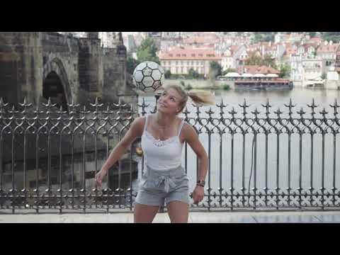 Female football freestyler doing her tricks in Prague