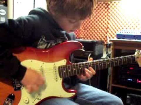 11 Year old Kid Plays Through the Fire And Flames! REAL!