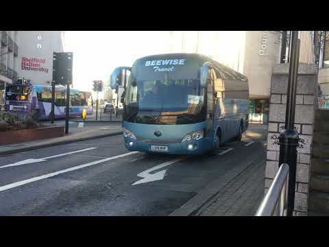 Beewise Travel LS15 NHF heads down High Street with a Asos service