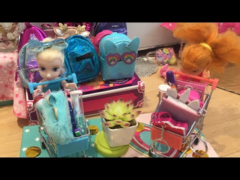 Elsa and Anna toddlers - go shopping at Claire’s for school supplies!!