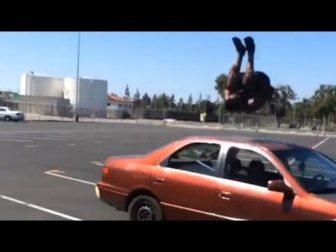Guy flips over two cars in parking lot