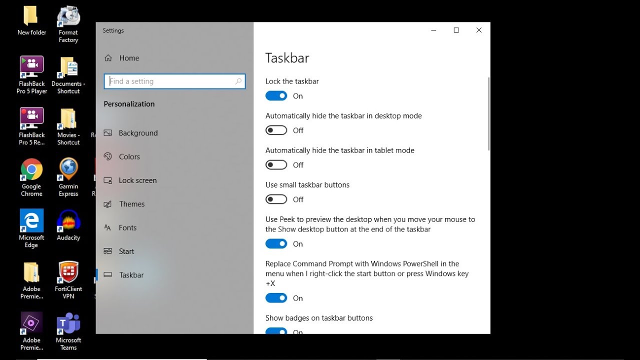 How do I make the taskbar appear on both screens? Tipseri