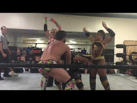 Bar Wrestling:  Kris Wolf tail flips Joey Ryan