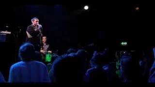 Derrick Brown performs his poetry in Belgium