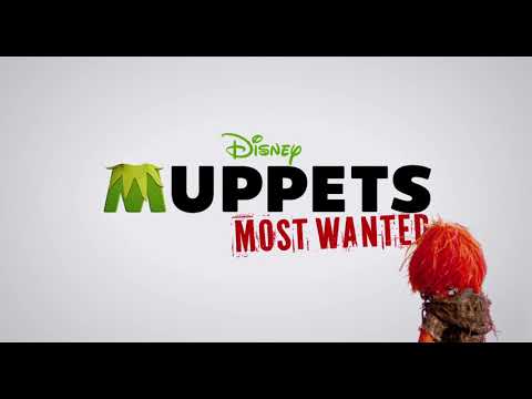 Trailer frame of stage lights and velvet drapes that match Constantine’s lounge-serenade vibe