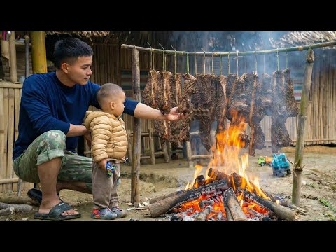 Nick and the child drying meat for Tet - my friend A Pao has left.