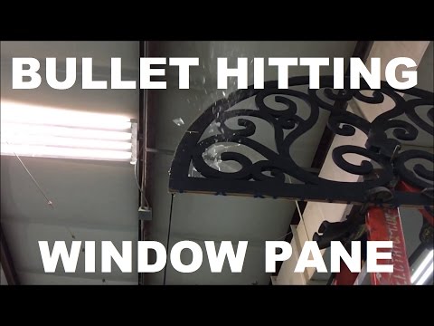 Bullet hitting a window pane