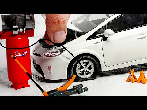 Changing Tyres of Miniature Prius Diecast Model 1:18 Scale