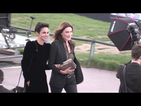 Carla Bruni, Beatrice Dalle and more arrive in style at the Saint Laurent Show in Paris