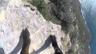 Rescued wild Mallorquin goat with gopro climbing cliffs in Mallorca