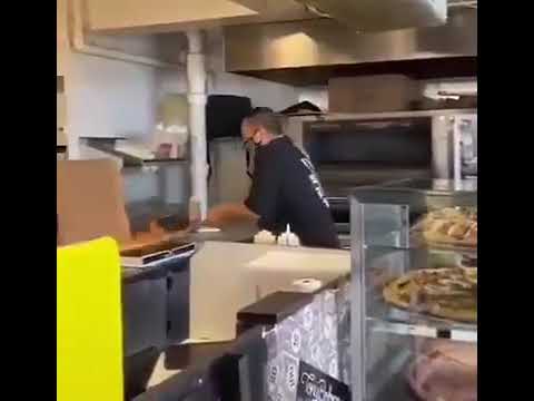 guy tries to put out burning pizza by punching it meme