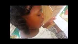 preview picture of video 'MBK girl reading her Spanish Bible ~ Biblia en español para niños'