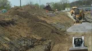 preview picture of video 'Stone Creek Retaining Wall Rebuild in Full Swing'