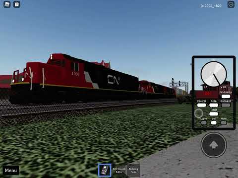 X148 Flies by Durand, MI with CN 1007 (SD70) leading