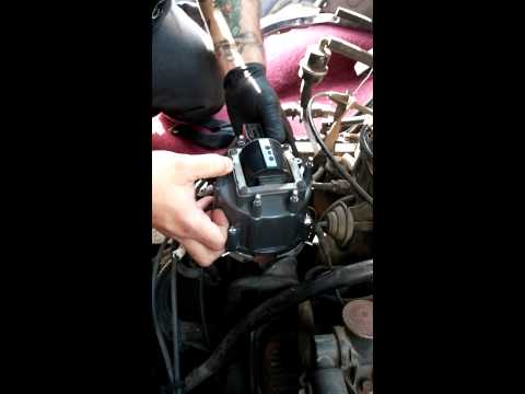 How to replace a distributor cap and rotor