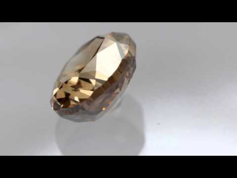 0.55 ctw, 5.29 x 4.15 mm, Champagne Color, VS2 Clarity, Oval Cut Loose Diamond - www.diamondzul.com