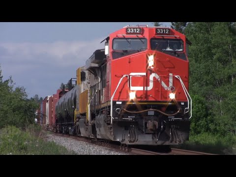 Nice AC44C6M Leader and the Sun! Manifest Train CN 594 West Passing thru River Glade, NB