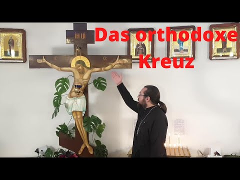 Das orthodoxe Kreuz und der Hahn