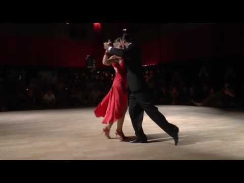  Rodrigo Rufino  and  Gisela Passi  are  dancing  to  "  Este Es El Rey  "  at  Tango Roots  in  2016