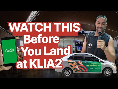 Don't Get Ripped Off at KLIA2! (Grab vs. Taxi Guide)