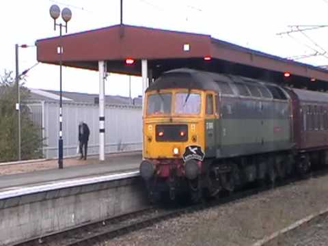 47851 (D1648) 'Traction Magazine' departs York with 37767 'Loch Rannoch' on the rear
