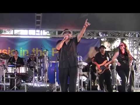 Ex-Midniter lead singer Hank Castro onstage with Mystique at Music in the Park