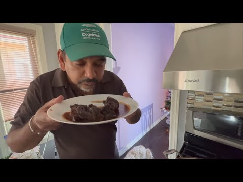 Making Pepperpot /Traditional Guyanese food.